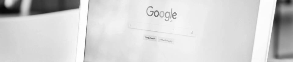 Black and white image symbolizing Google search results, showcasing how CodexCon boosts your business's SEO.